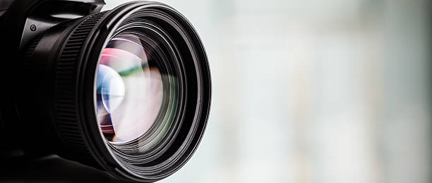 close-up of a digital camera. large copyspace - lens stok fotoğraflar ve resimler