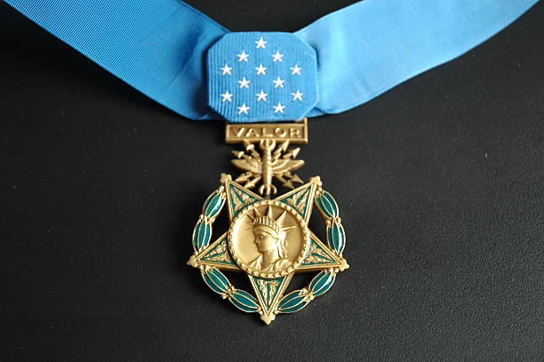 Close-up of a Medal of Honor for valor with a blue ribbon The Medal of Honor taken on a black background wildlife reserve stock pictures, royalty-free photos & images