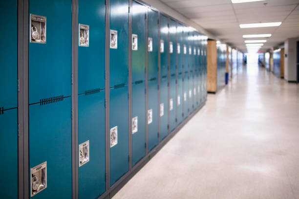 Close-up of a row of school lockers Close-up of a row of school lockers school stock pictures, royalty-free photos & images