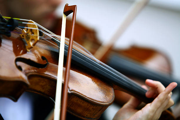 Close-up of a woman playing a viola stock photo
