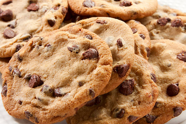 A close-up of chunky chocolate chip cookies stock photo