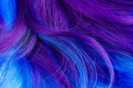 Closeup Of Colorful Hair In Purple And Turquoise Blue Colors Stock