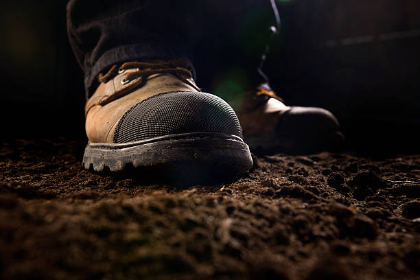 Close-up of construction work boots stock photo
