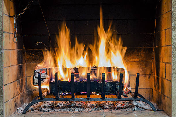 Closeup of firewood burning in fire. stock photo