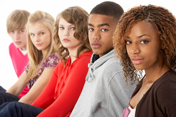 close-up of five teenage friends posing for a portrait - alleen tieners stockfoto's en -beelden