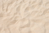 istock closeup of sand pattern of a beach in the summer 678719470