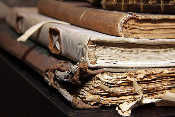 Closeup of stacked old books stock photo