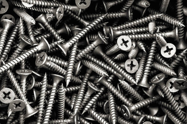 Closeup of steel screws many screws on box can be use as background stock photo