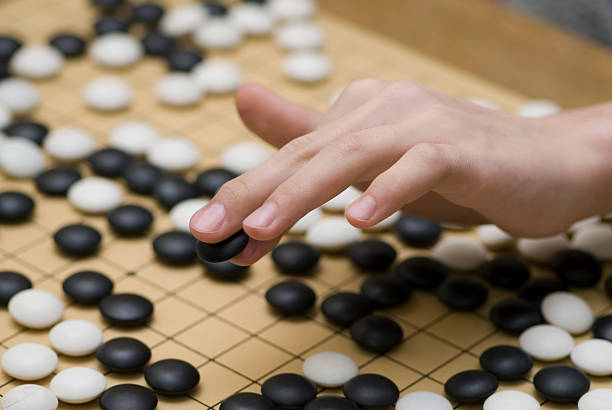 Close-up of traditional oriental logic game Go stock photo
