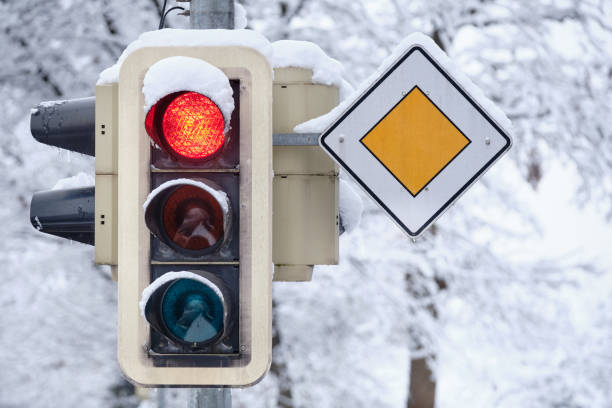 Closeup of traffic lights showing red color in winter stock photo