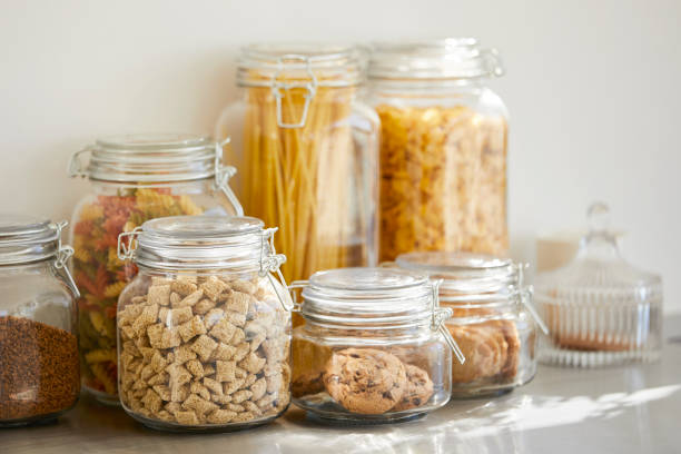 close-up of various food in airtight jars - contentores imagens e fotografias de stock