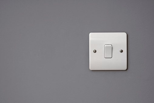 Closeup Of White Square Light Switch On The Wall Stock Closeup Of White Square Light Switch On The Wall Stock