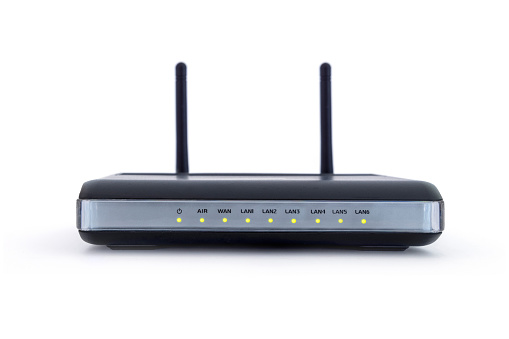 Close up of wireless wi-fi router with two antennas and six channel- isolated on white background. High speed internet connection, computer network and telecommunication technology concept Kopie