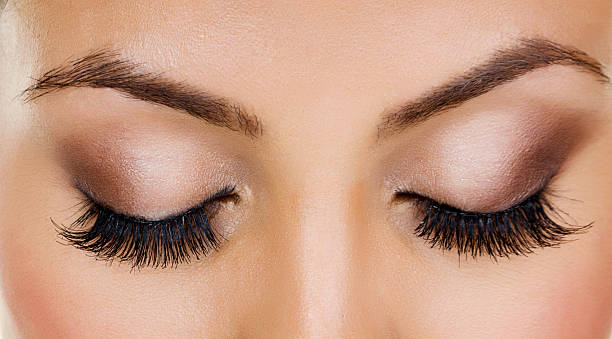 Closeup of woman with long eyelashes stock photo