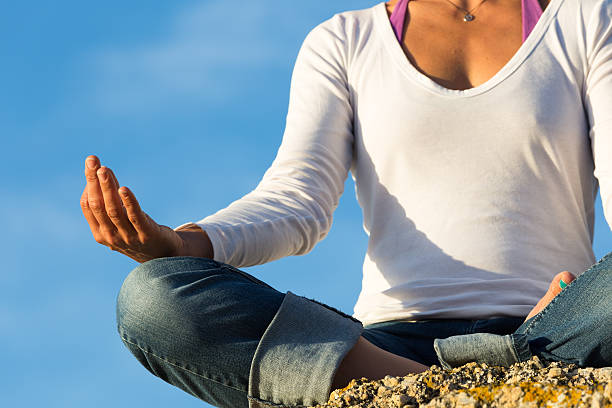 Close-up of Young Woman Meditating stock photo