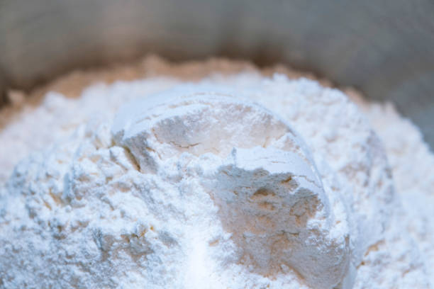 Closeup on a heap of white flour stock photo