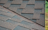 istock A close-up on the problem, critical area of a roof valley and drip edge covered with asphalt dimensional shingles above metal roof flashing. 1311417721