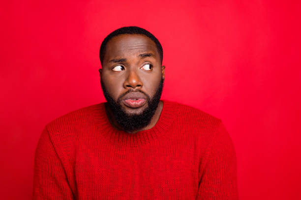 Close-up portrait of his he nice attractive uncertain unsure scared bearded guy phobia scary information isolated over bright vivid shine red background Close-up portrait of his he nice attractive uncertain unsure scared bearded guy phobia, scary information isolated over bright vivid shine red background worried man funny stock pictures, royalty-free photos & images