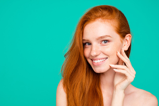 Close-up Portrait Of Nude Positive Red-haired Girl With 