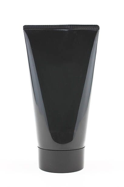 Close-up shot of a black tube isolated on a white background stock photo