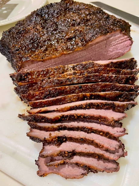 Close-up, Smoked Sliced Beef Brisket With Knife stock photo
