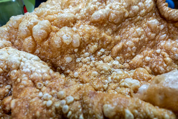 Close-up view of a sheet of pork skin that had been deep fried stock photo