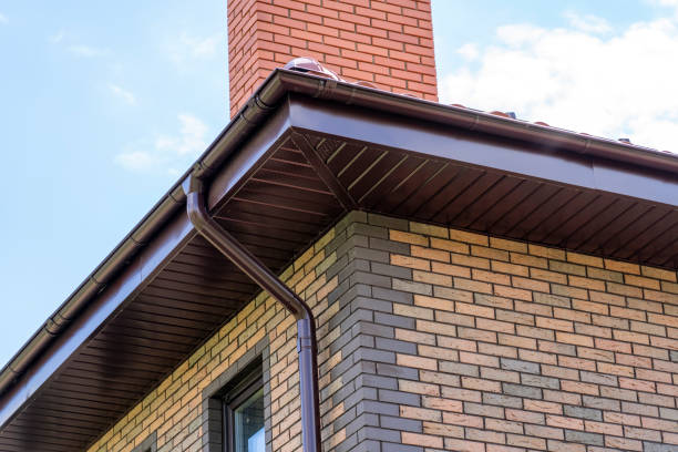 close-up view of house with brown roof and filing of roof overhangs with soffits and brick stone chimney pipe close-up view of house with brown roof and filing of roof overhangs with soffits and brick stone chimney pipe roof beam stock pictures, royalty-free photos & images