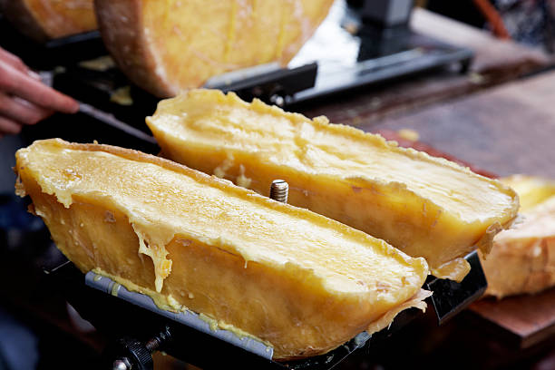 A close-up view of raclette cheese stock photo