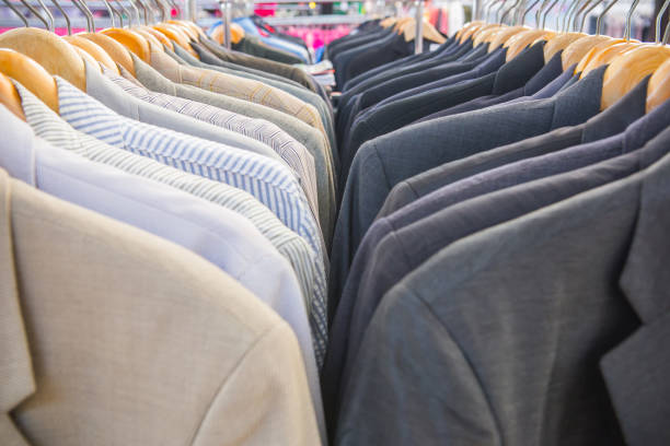 cloth Selective focus men shirt on rack mens fashion stock pictures, royalty-free photos & images