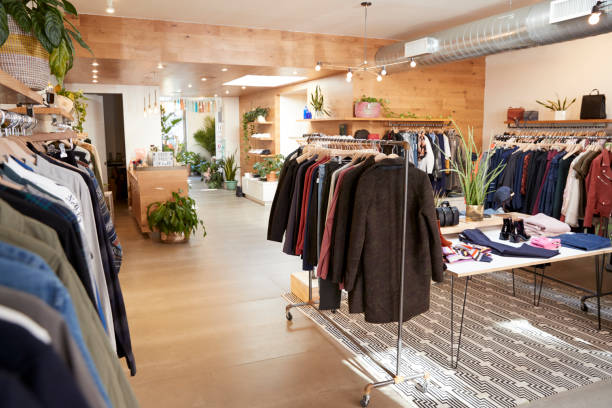 Clothes shop interior Clothes shop interior clothing stock pictures, royalty-free photos & images