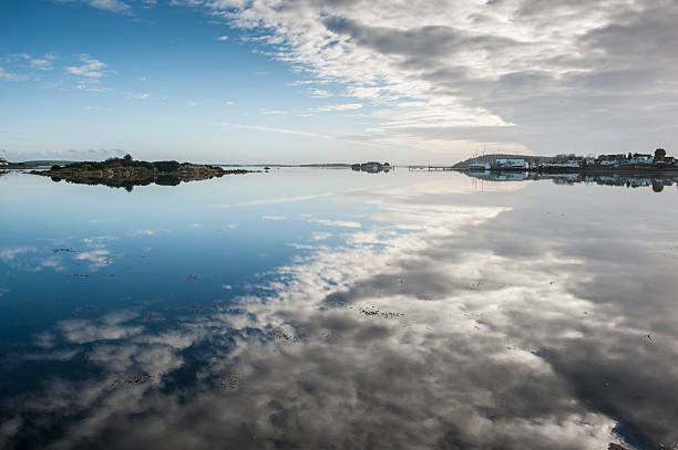 Cloud reflections over Whiterock Bay Cloud reflections over Whiterock Bay, Strangford Lough, Co Down, Northern Ireland strangford lough stock pictures, royalty-free photos & images