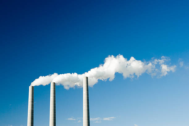 Cloudmaker smoke stacks on blue sky chimney stock pictures, royalty-free photos & images