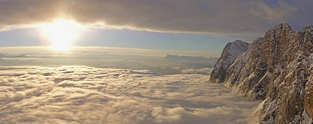 Clouds over Dachstein at Sunset stock photo