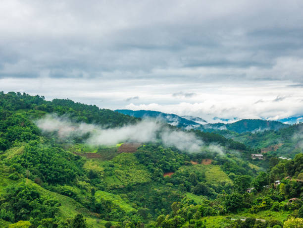 clouds over the mountains in Thailand. stock photo