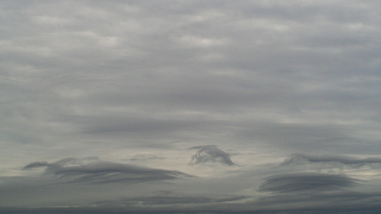 Bank of altostratus and stratocumulus covering the sky.  An Atlantic disturbance is approaching