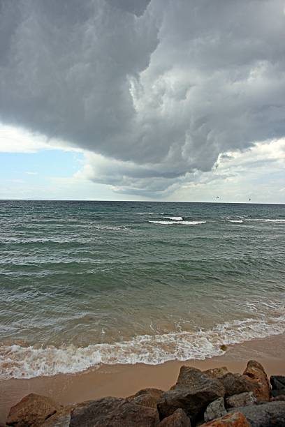 Cloudy beach day stock photo