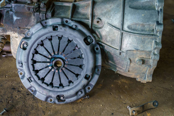 Clutch Cover expire on background gear transmission. stock photo