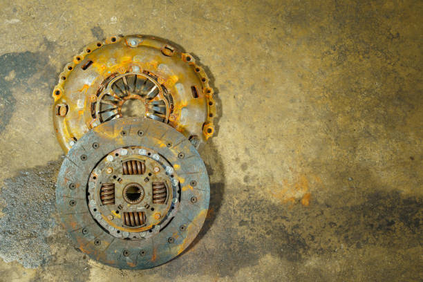 clutch plate and Clutch Cover expire on dirty background.There are rust stains. stock photo