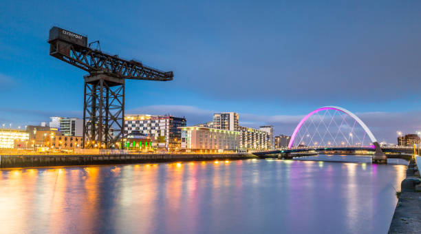 Clyde Arc and Glasgow Skyline at Night stock photo