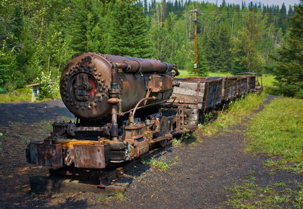 Coal Mine Train in Bankhead Ghost Town. old steam locomotive. Rocky mountain ( Canadian Rockies ). Near the city of Calgary. Portrait, fine art. Banff National Park, Alberta, Canada: August 2, 2018 stock photo