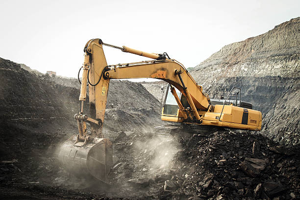 Coal Mining Excavator Coal Mining Excavator coal mine stock pictures, royalty-free photos & images