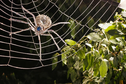 Cobweb and spider made with artisan materials