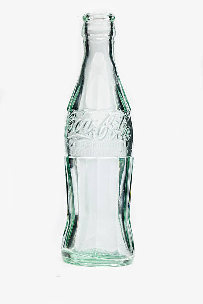 1916 Coca Cola Contour Bottle. Empty. stock photo