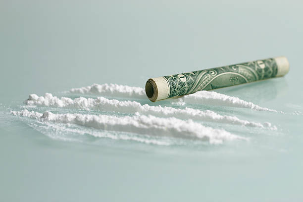 Cocaine lines with rolled up dollar bill Cocaine and dollar cocaine stock pictures, royalty-free photos & images