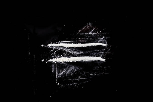 cocaine roads on a black table cocaine roads on a black table cocaine stock pictures, royalty-free photos & images
