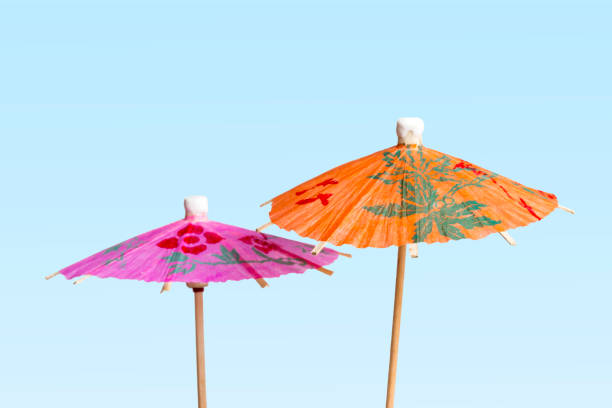 Cocktail drink umbrellas, paper parasols stock photo