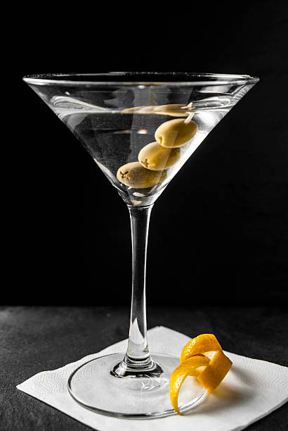 cocktail cocktail, olives, bar, drink, ice, vodka, martini, James Boond, alcohol, glass, bartending, miksologia, black background, spoon bartender, mixed, sheikhs, gin, zest, lemon flavor, restaurant, menu, card of cocktails, classic vodka martini, dirty martini, dirty martini stock pictures, royalty-free photos & images