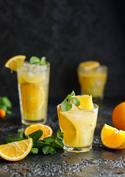 Cocktail screwdriver. Homemade orange cocktail with mint and vodka. Rum with orange juice Cocktail screwdriver. Homemade orange cocktail with mint and vodka. Rum with orange juice screwdriver drink stock pictures, royalty-free photos & images