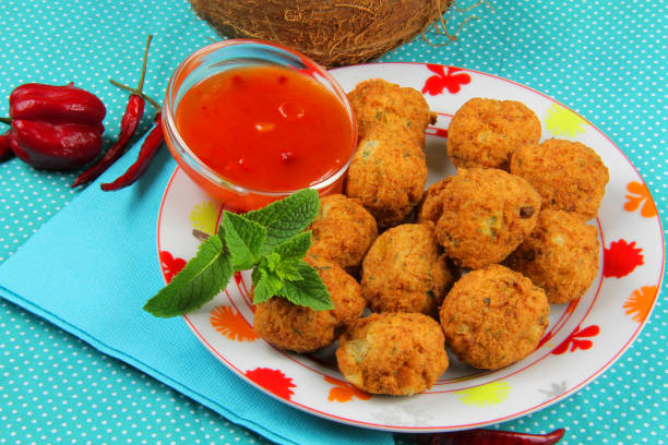 cod fritters cod accras with a foirde sauce antilles stock pictures, royalty-free photos & images