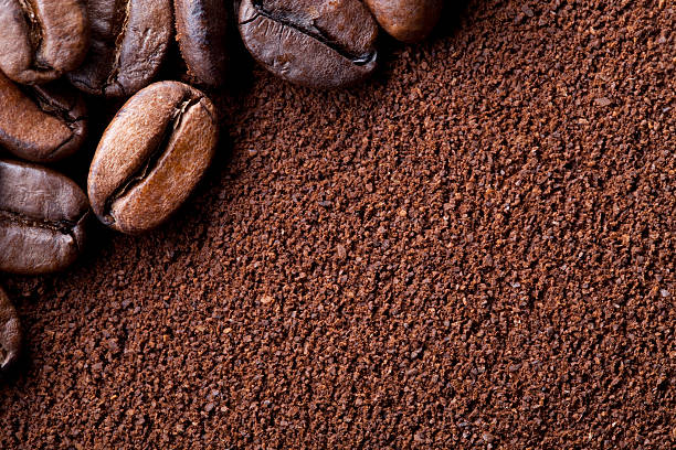 Coffee beans Coffee beans and ground coffee.To see more Coffee images click on the link below: grinding stock pictures, royalty-free photos & images